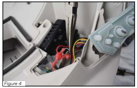 Lifting red and white wires out of the wire channel