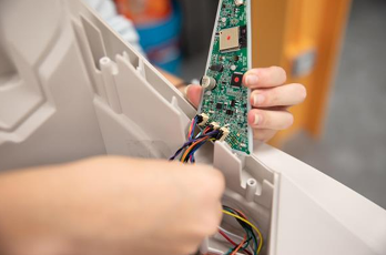 Disconnecting the three circuit board connectors