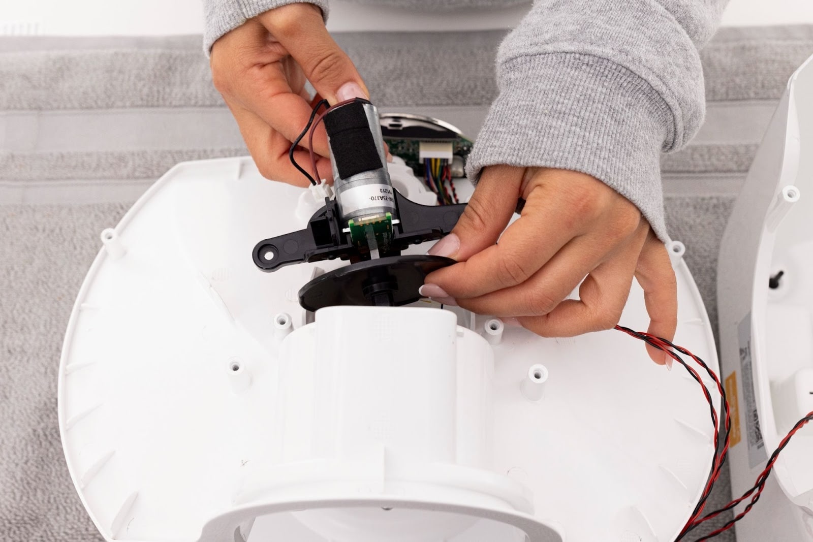 Removing the motor assembly: Tilting the rear of the motor assembly upward and pull back.