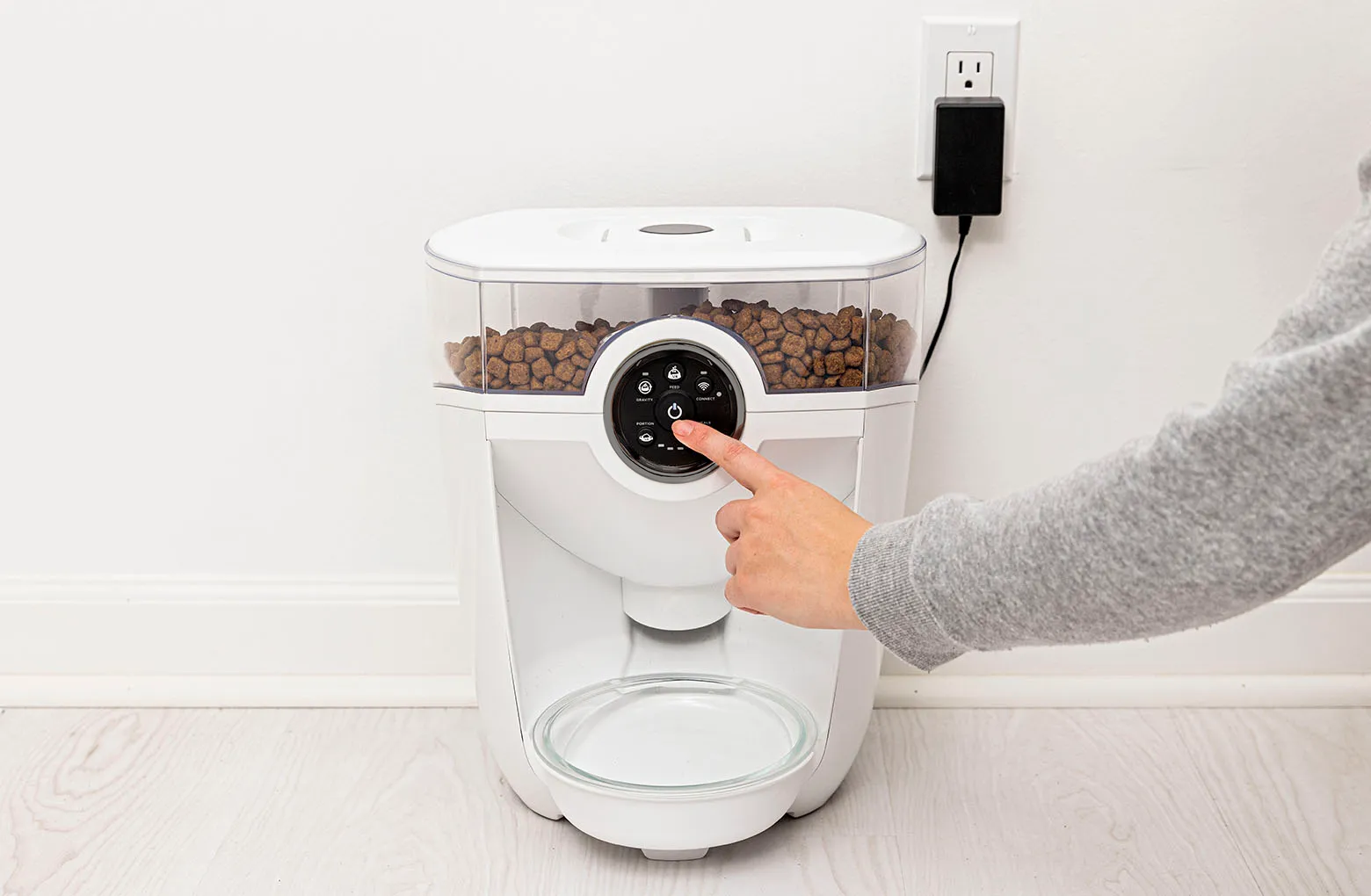 plugging in Feeder-Robot, and powering it on